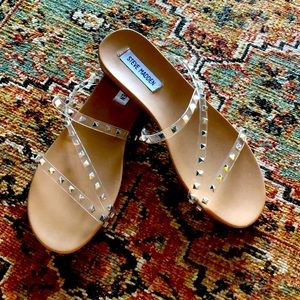 Steve Madden studded clear sandals.